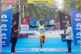 Ethiopia’s Tadu Abate Deme crossed the finish line to win the overall men’s title at the Tata Mumbai Marathon 2026